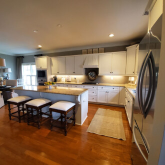 Kitchen with brown floor